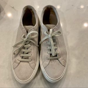 Women by Common Projects suede shoes.